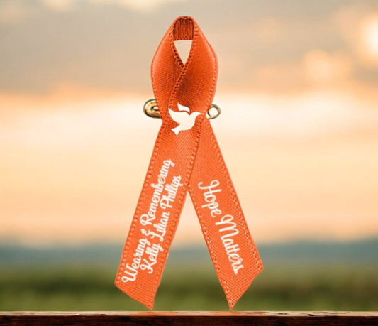 Understanding the Leukemia Cancer Ribbon Color - The Funeral Program Site